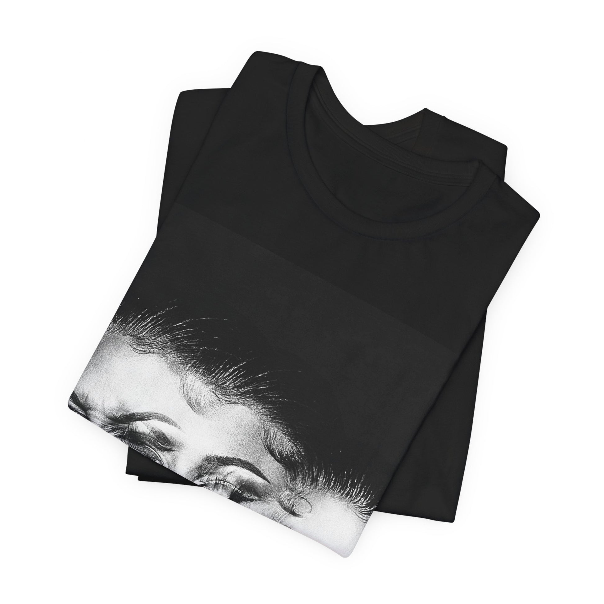 A black graphic t-shirt featuring a graphic related to Megan Thee Stallion's 'Traumazine' album.