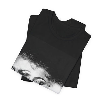 A black graphic t-shirt featuring a graphic related to Megan Thee Stallion's 'Traumazine' album.