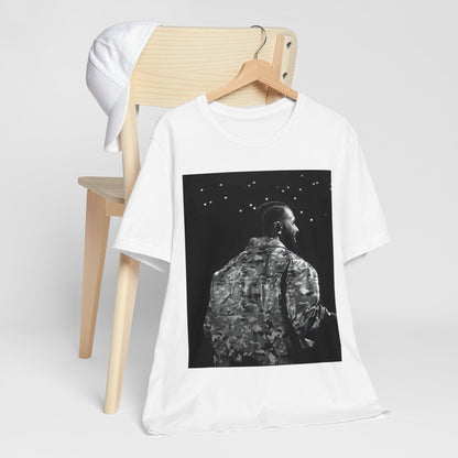 A black graphic t-shirt featuring a black and white graphic or photo of Drake performing live on stage.