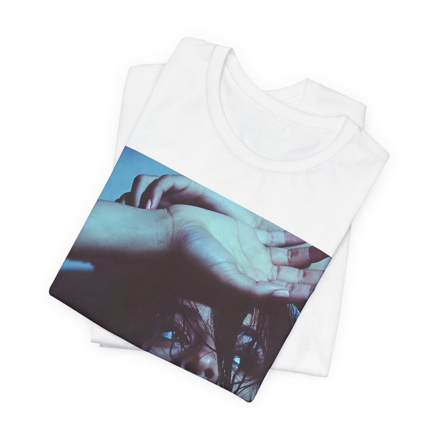 A black graphic t-shirt featuring a graphic related to Camila Cabello's "Señorita" song, possibly with dance-inspired elements.