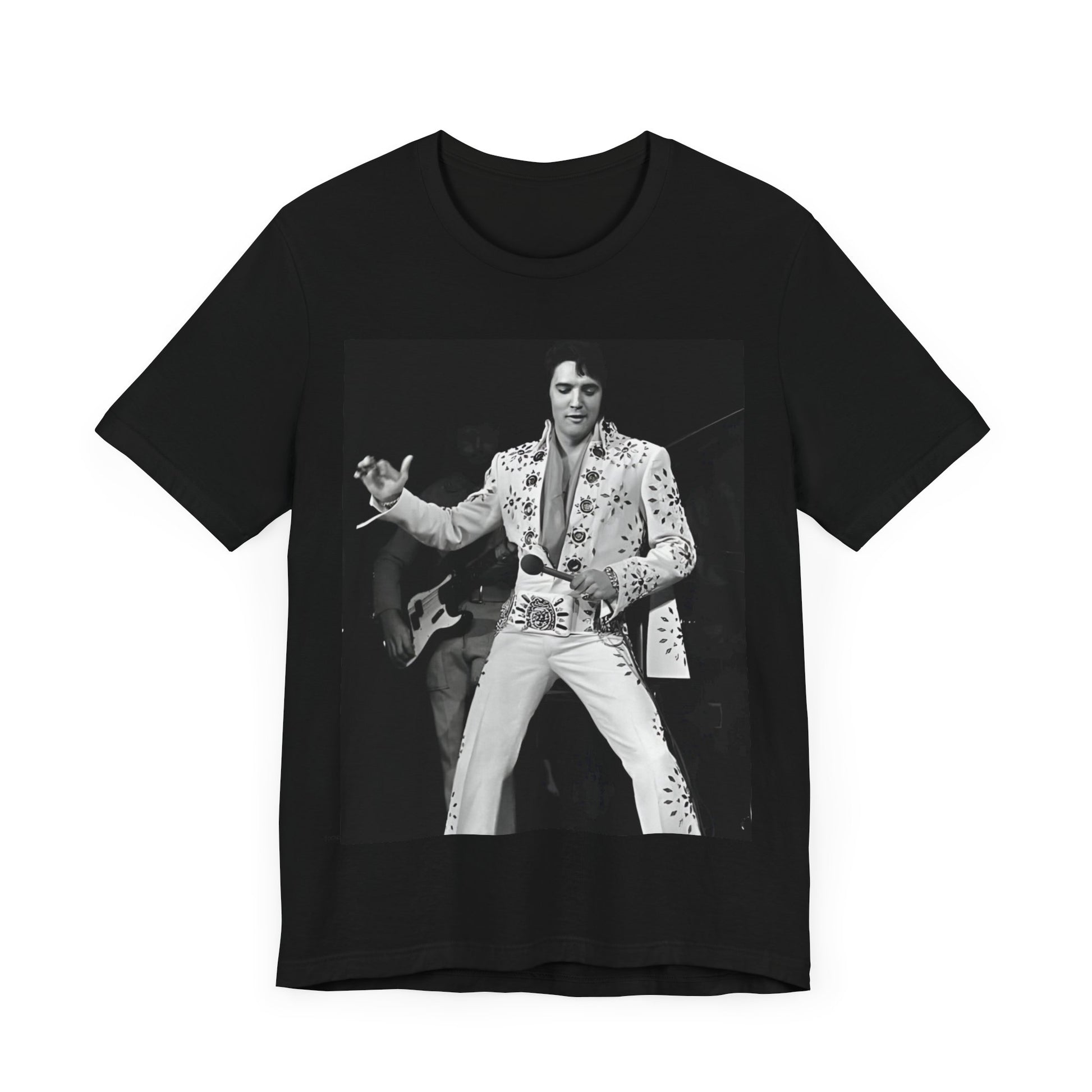 A black graphic t-shirt featuring a stylized graphic of Elvis Presley as The King of Rock 'n' Roll.