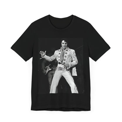 A black graphic t-shirt featuring a stylized graphic of Elvis Presley as The King of Rock 'n' Roll.