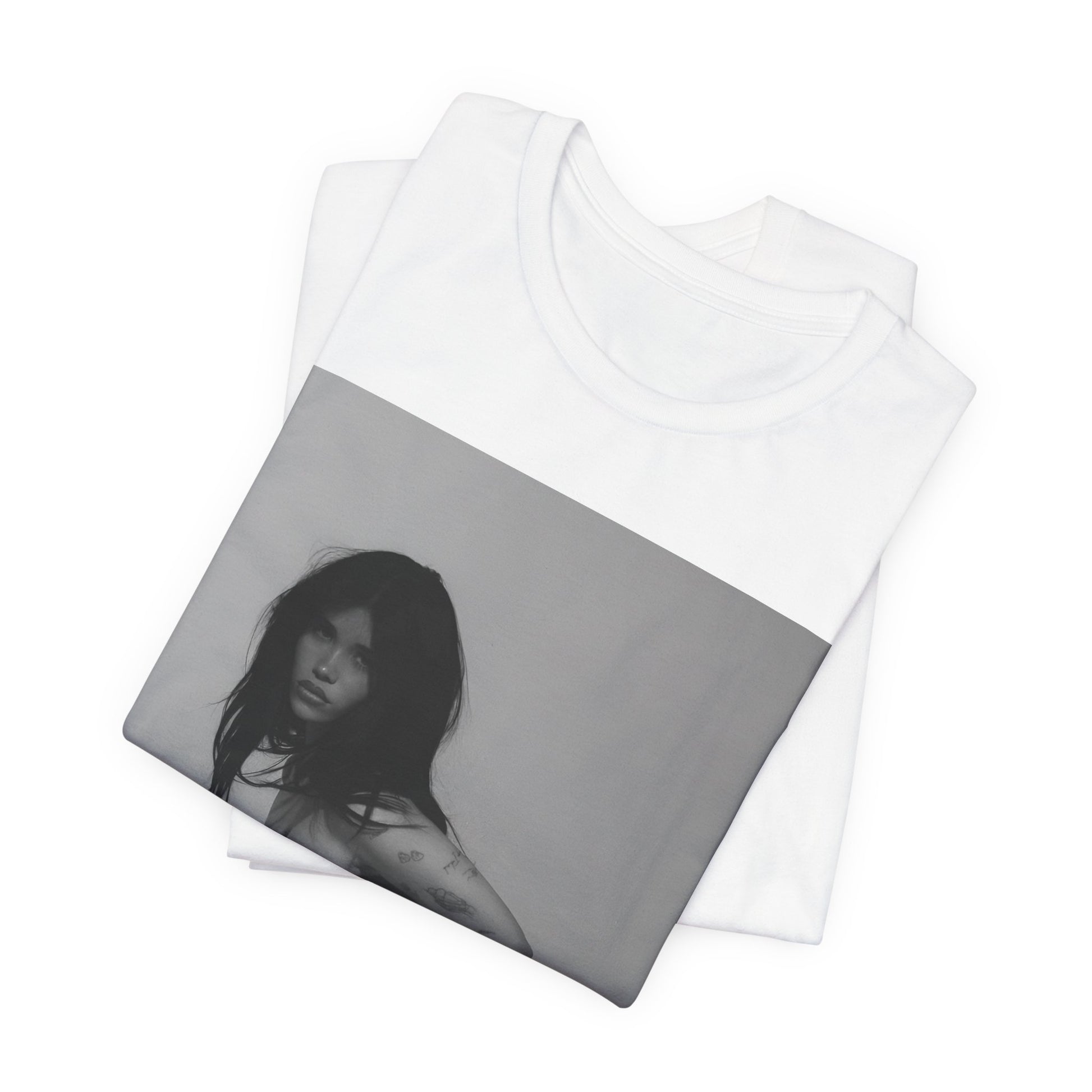 A black graphic t-shirt featuring a black and white, monochrome graphic or photo of Nessa Barrett.