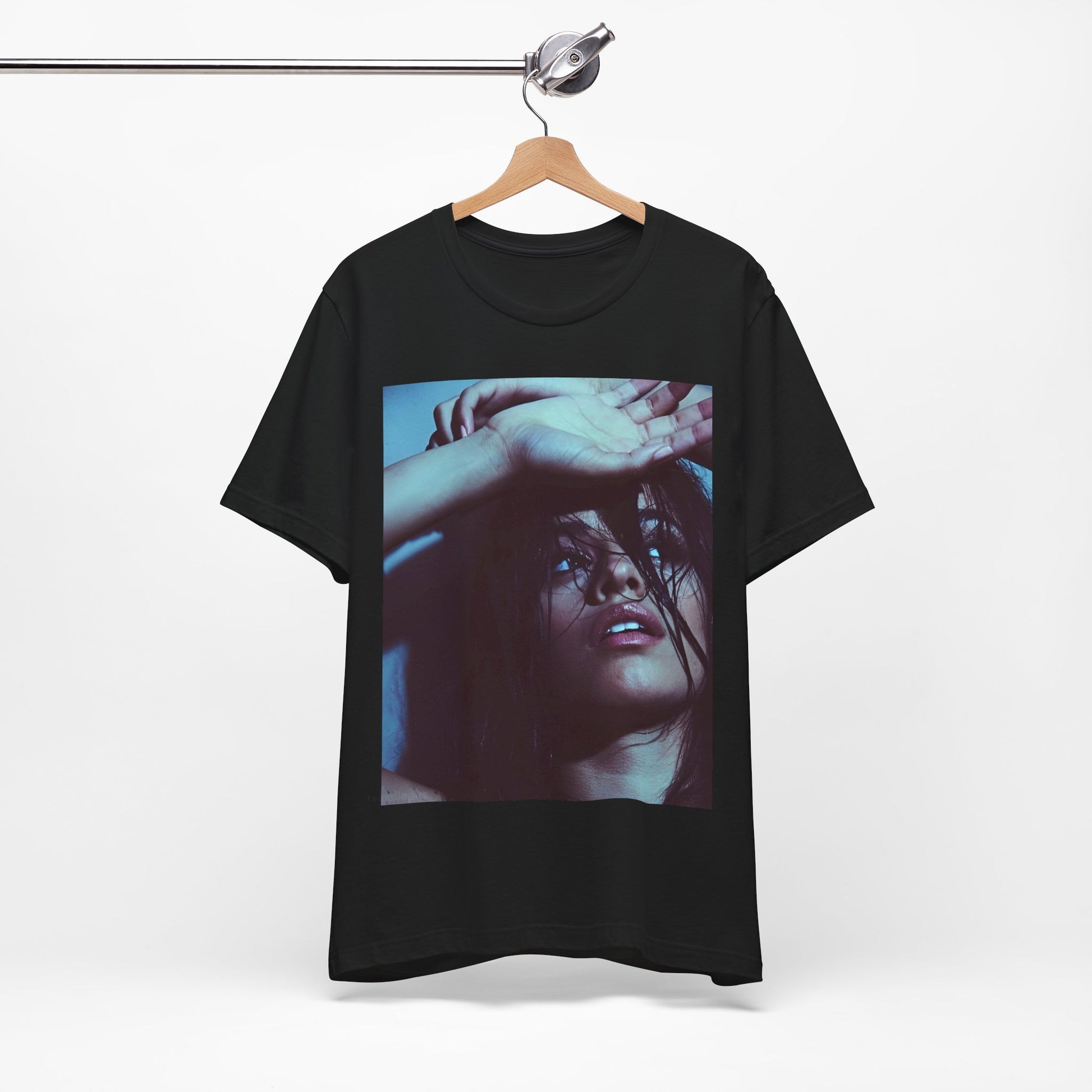 A black graphic t-shirt featuring a graphic related to Camila Cabello's "Señorita" song, possibly with dance-inspired elements.