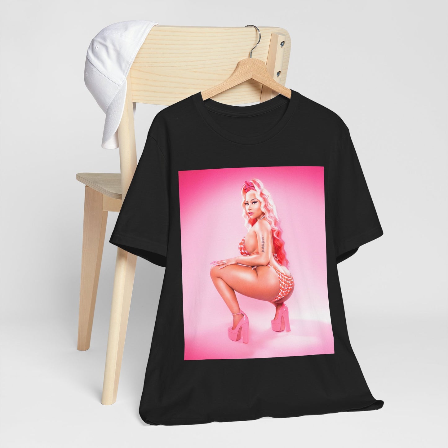 A black graphic t-shirt featuring a graphic related to Nicki Minaj's 'Anaconda' song or era.