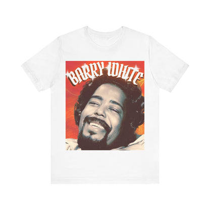 A black graphic t-shirt featuring a graphic of Barry White, emphasizing his iconic soulful presence from the 1970s.