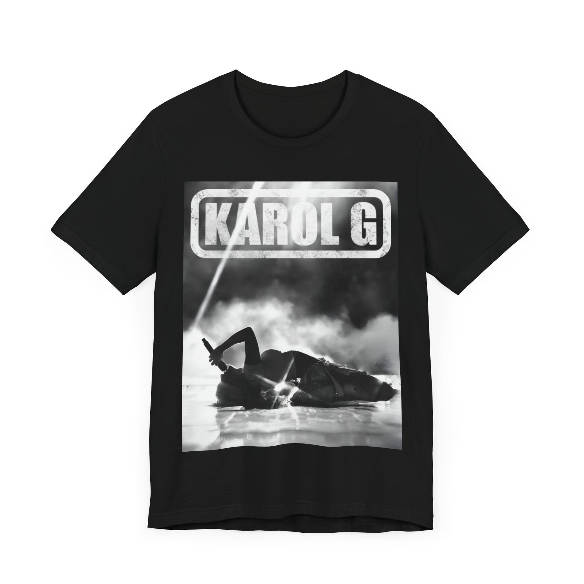 A black graphic t-shirt featuring a black and white graphic or photo of Karol G performing live on stage.