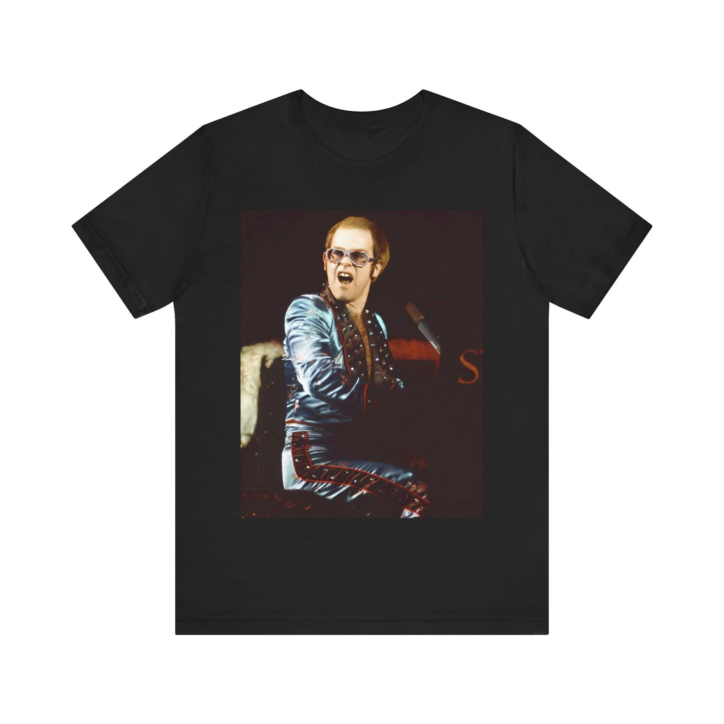 A black graphic t-shirt featuring a retro graphic related to Elton John's 'Rocket Man' song or era.