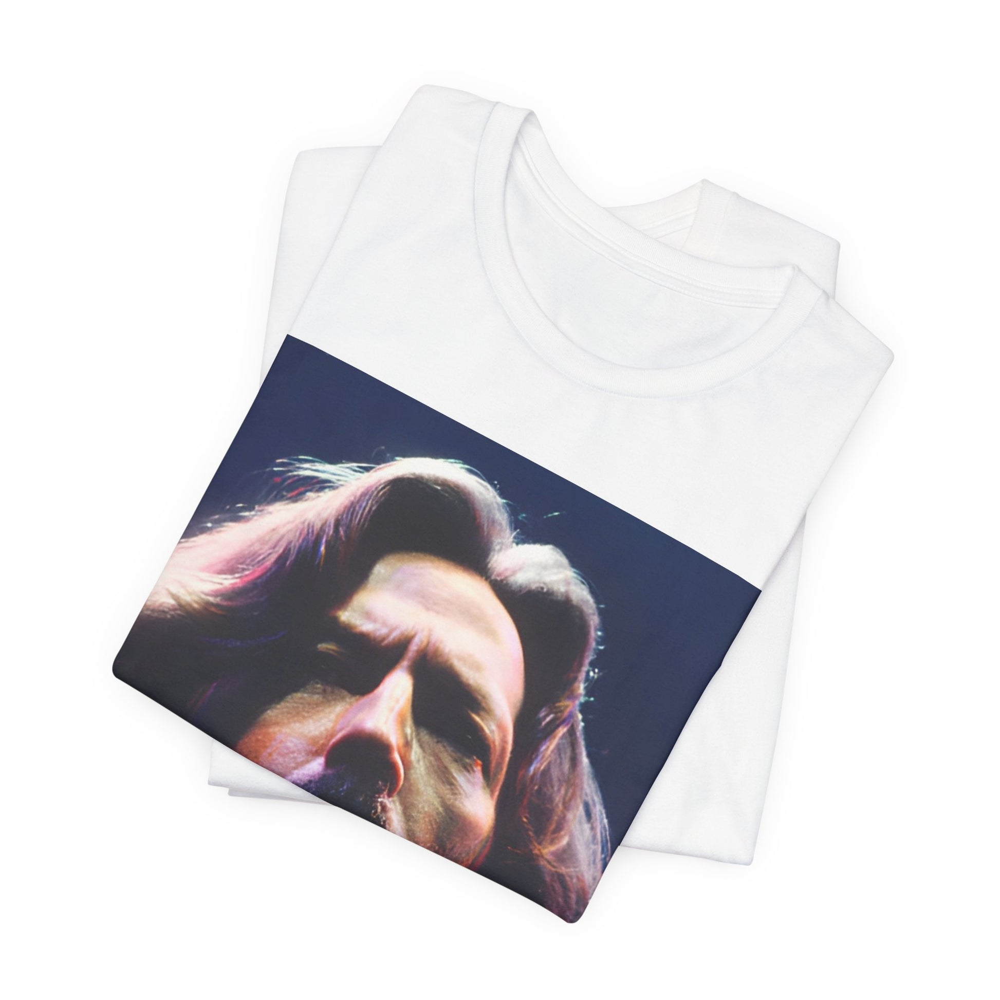 A black graphic t-shirt featuring a graphic related to Eric Clapton's 'Tears in Heaven' song or era.