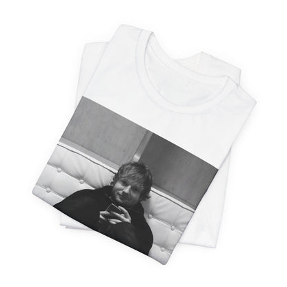 A black graphic t-shirt featuring a bold black and white graphic of Ed Sheeran.