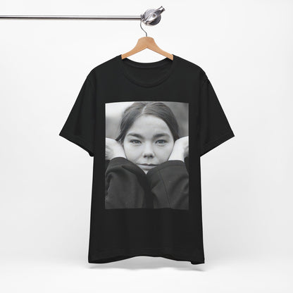 A black graphic t-shirt featuring a black and white portrait photo of Bjork.