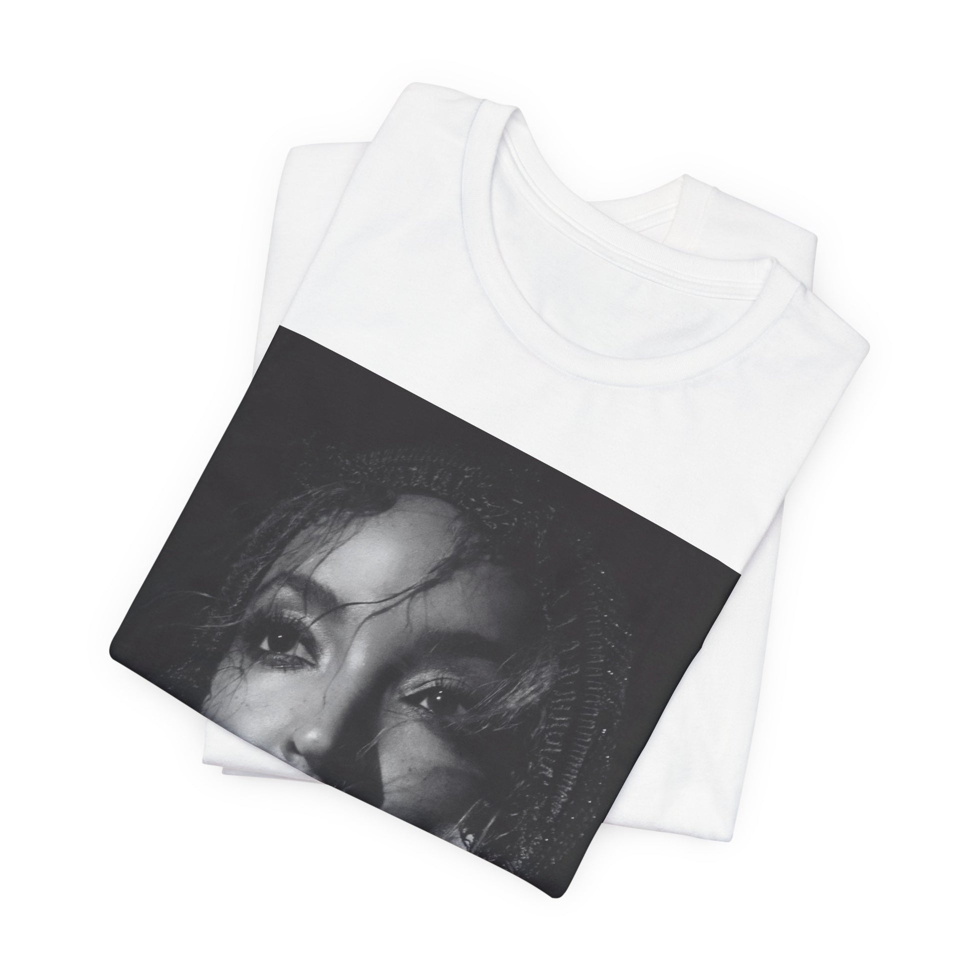 A black graphic t-shirt featuring a black and white portrait photo of Tinashe.