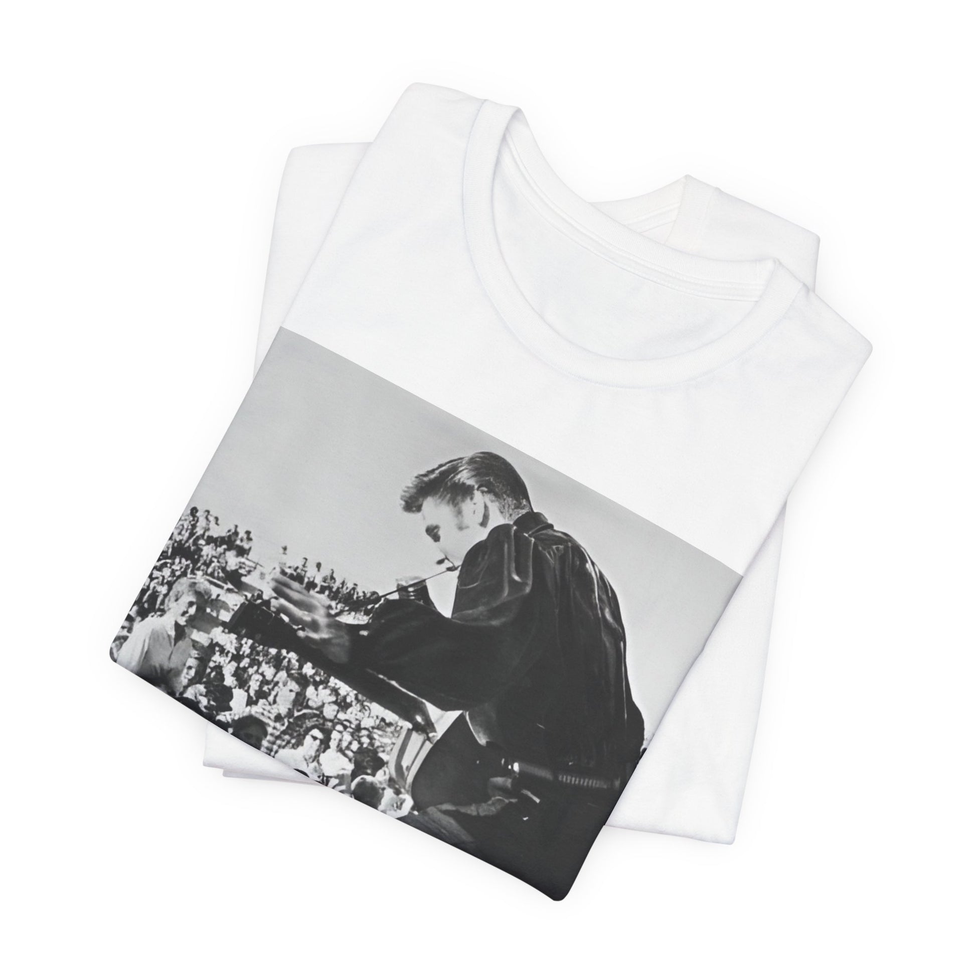 A black graphic t-shirt featuring a retro photo of Elvis Presley performing live in concert in the 1950s.
