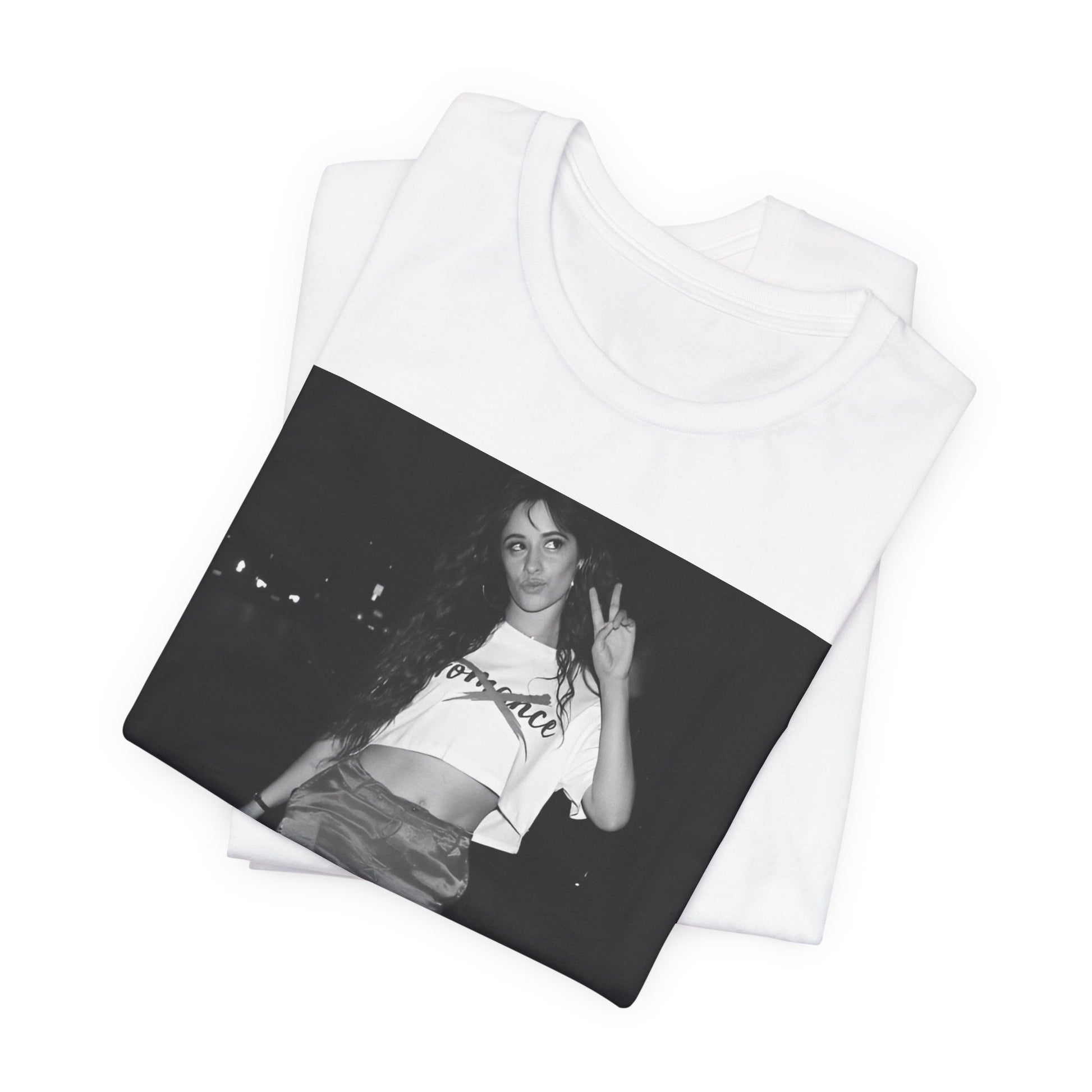 A black graphic t-shirt featuring a photo of Camila Cabello from her "Romance" album era.