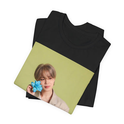 A black graphic t-shirt featuring a vintage K-Pop aesthetic graphic of Jimin.