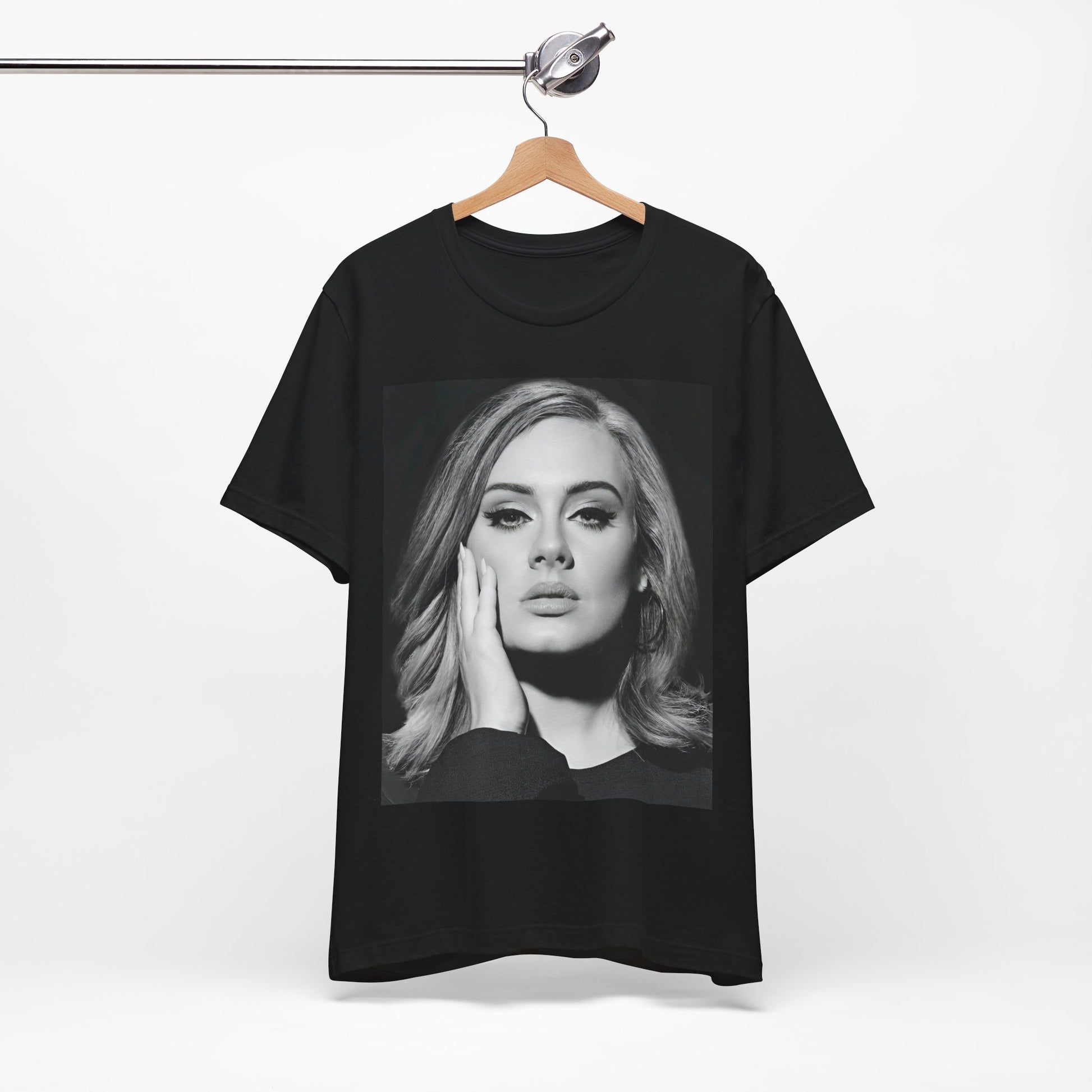 A black graphic t-shirt featuring a studio portrait of Adele from her '25' album era, showing a poised and thoughtful expression with her hair styled elegantly.