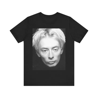 A black graphic t-shirt featuring a 90s black and white portrait photo of Thom Yorke from Radiohead.