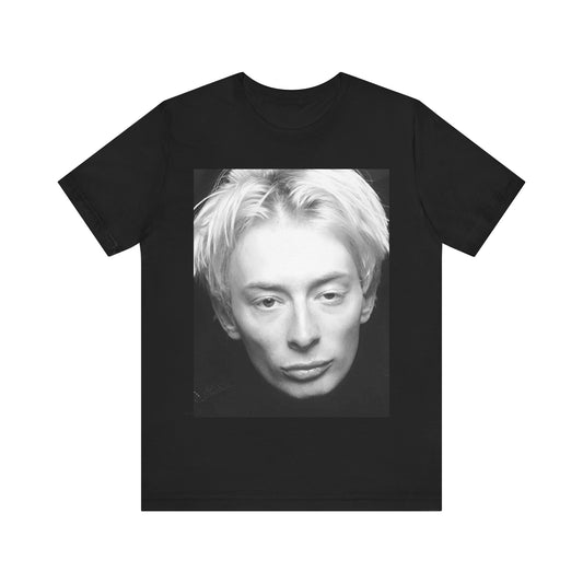 A black graphic t-shirt featuring a 90s black and white portrait photo of Thom Yorke from Radiohead.