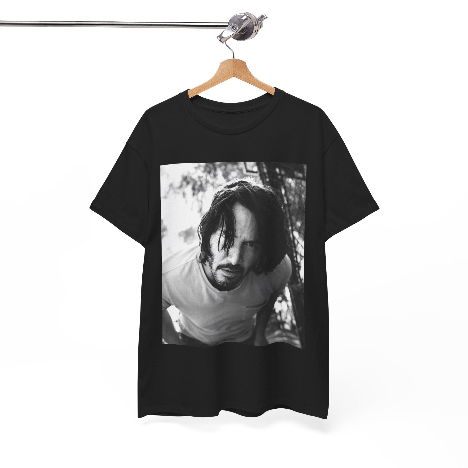 A black graphic t-shirt featuring a graphic of Keanu Reeves with authentic chill vibes.