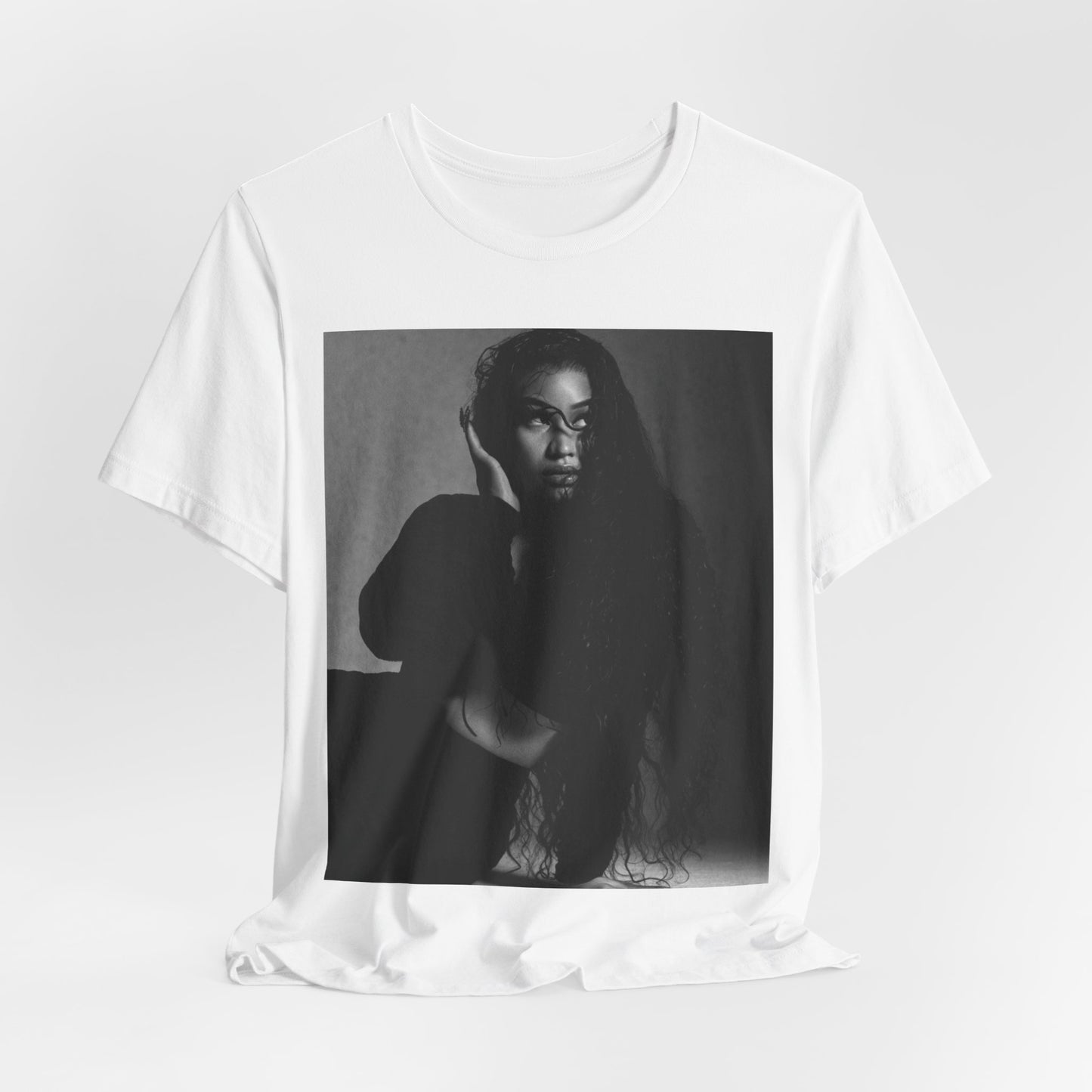 A black graphic t-shirt featuring a black and white graphic or photo of Nicki Minaj as a glamour queen.