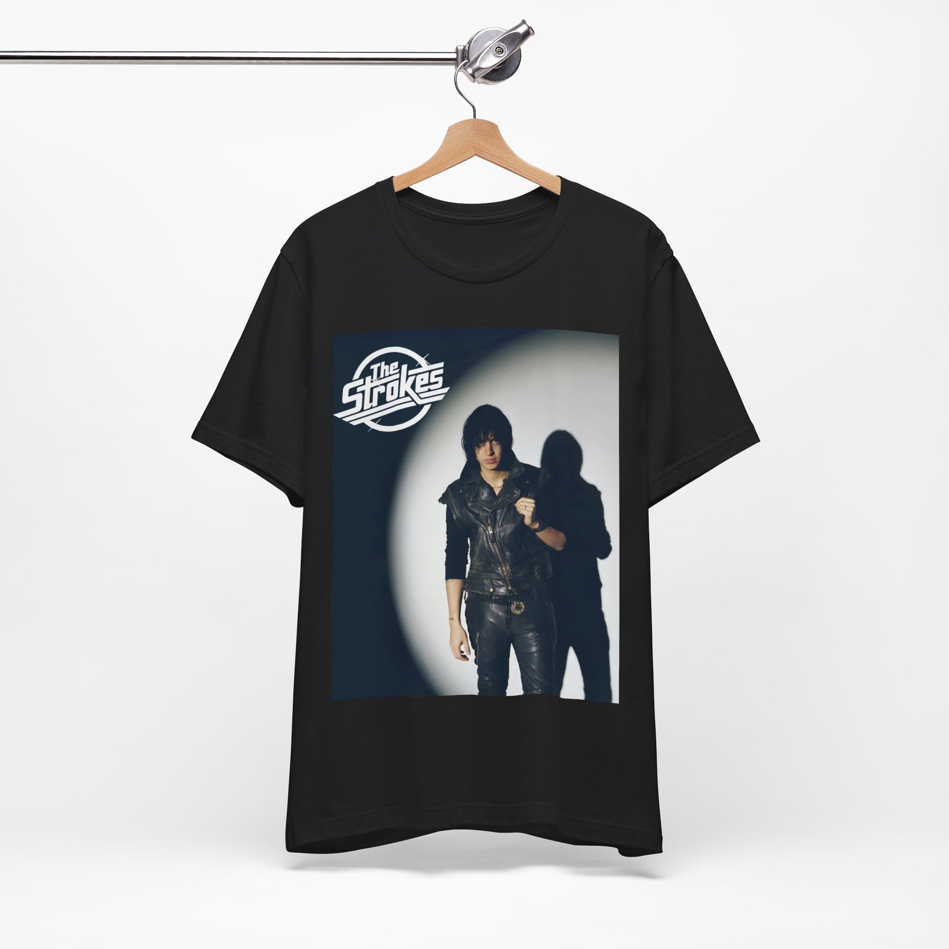 A black graphic t-shirt featuring a classic NYC garage rock graphic of The Strokes.