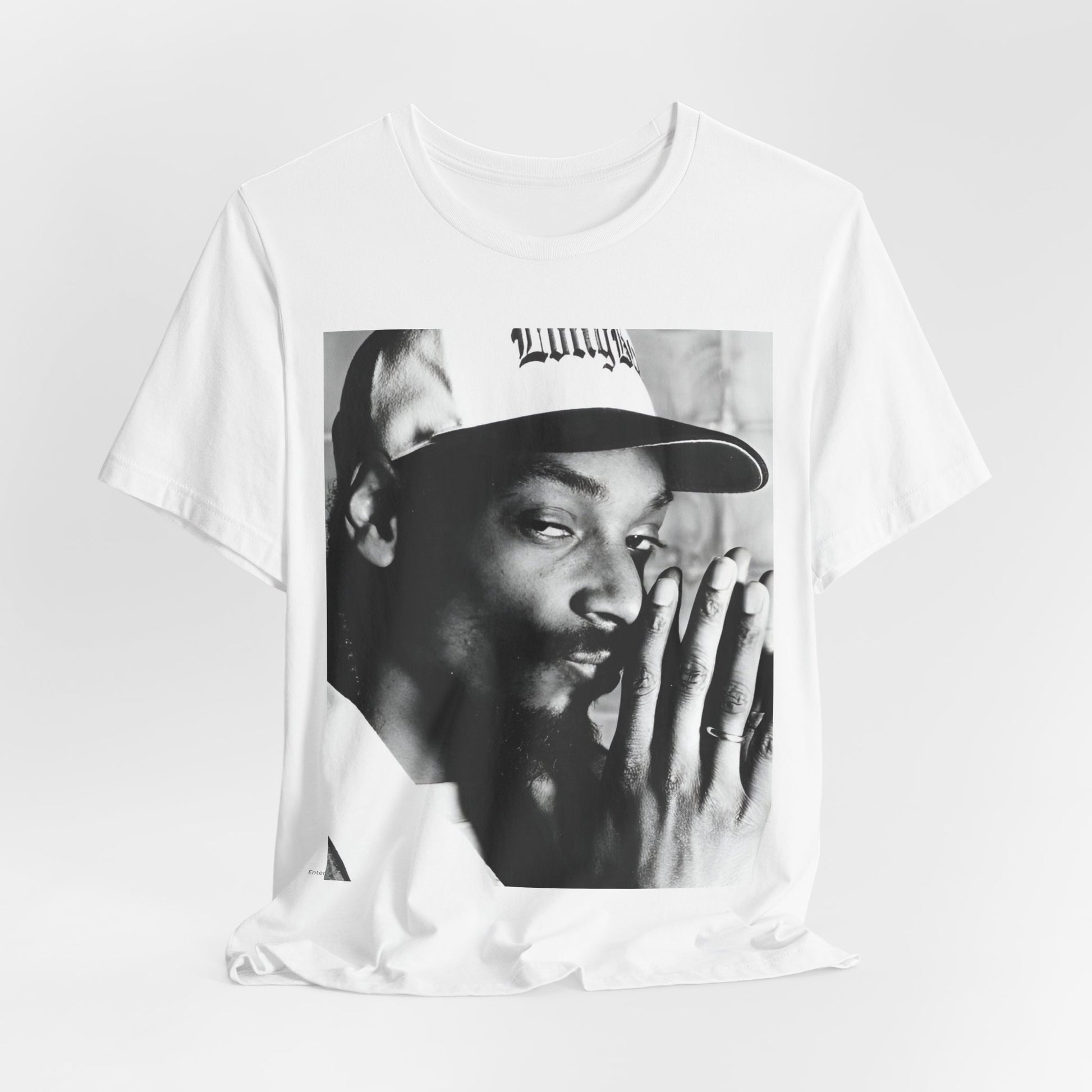 A black graphic t-shirt featuring a cool black and white graphic or photo of Snoop Dogg as a rapper.