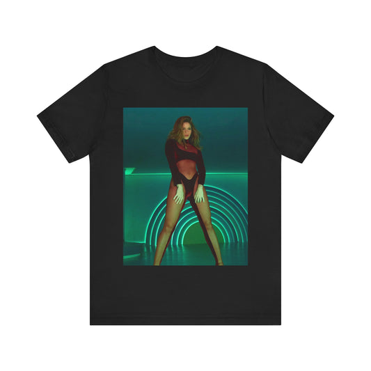 A black graphic t-shirt featuring a graphic of Shakira as the Queen of the Dance Floor.