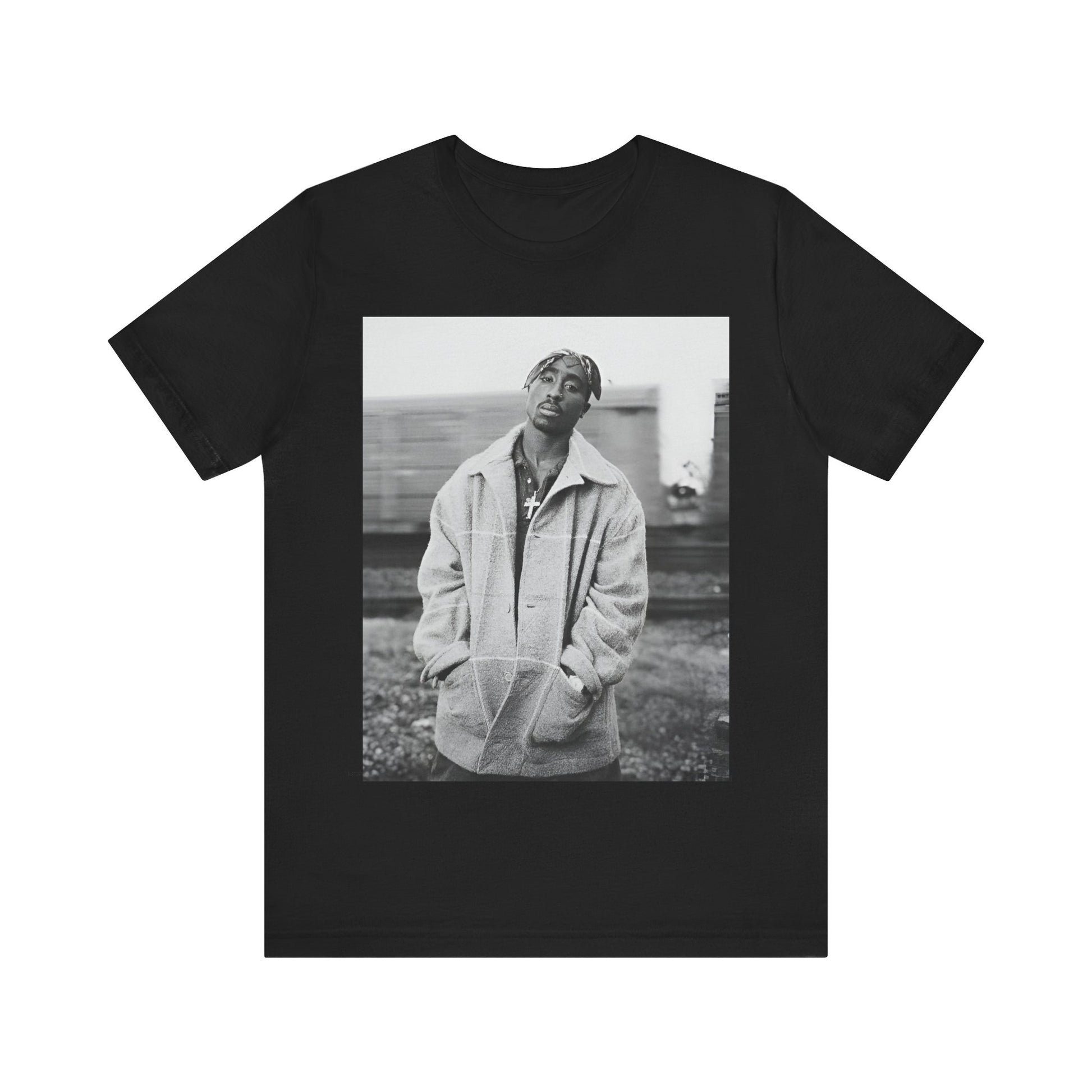 A black graphic t-shirt featuring a graphic related to Tupac's 'Thug Life' philosophy.