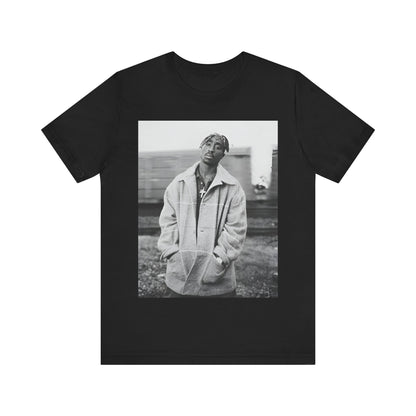 A black graphic t-shirt featuring a graphic related to Tupac's 'Thug Life' philosophy.