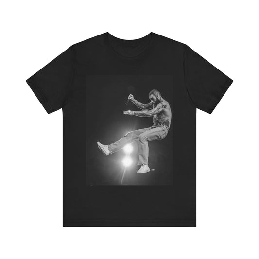 A black graphic t-shirt featuring a vintage graphic or photo of Post Malone performing live.