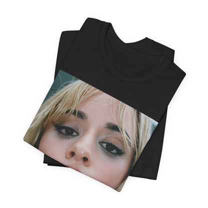 A black graphic t-shirt featuring a graphic related to Camila Cabello's C,XOXO album, with an aesthetic design.