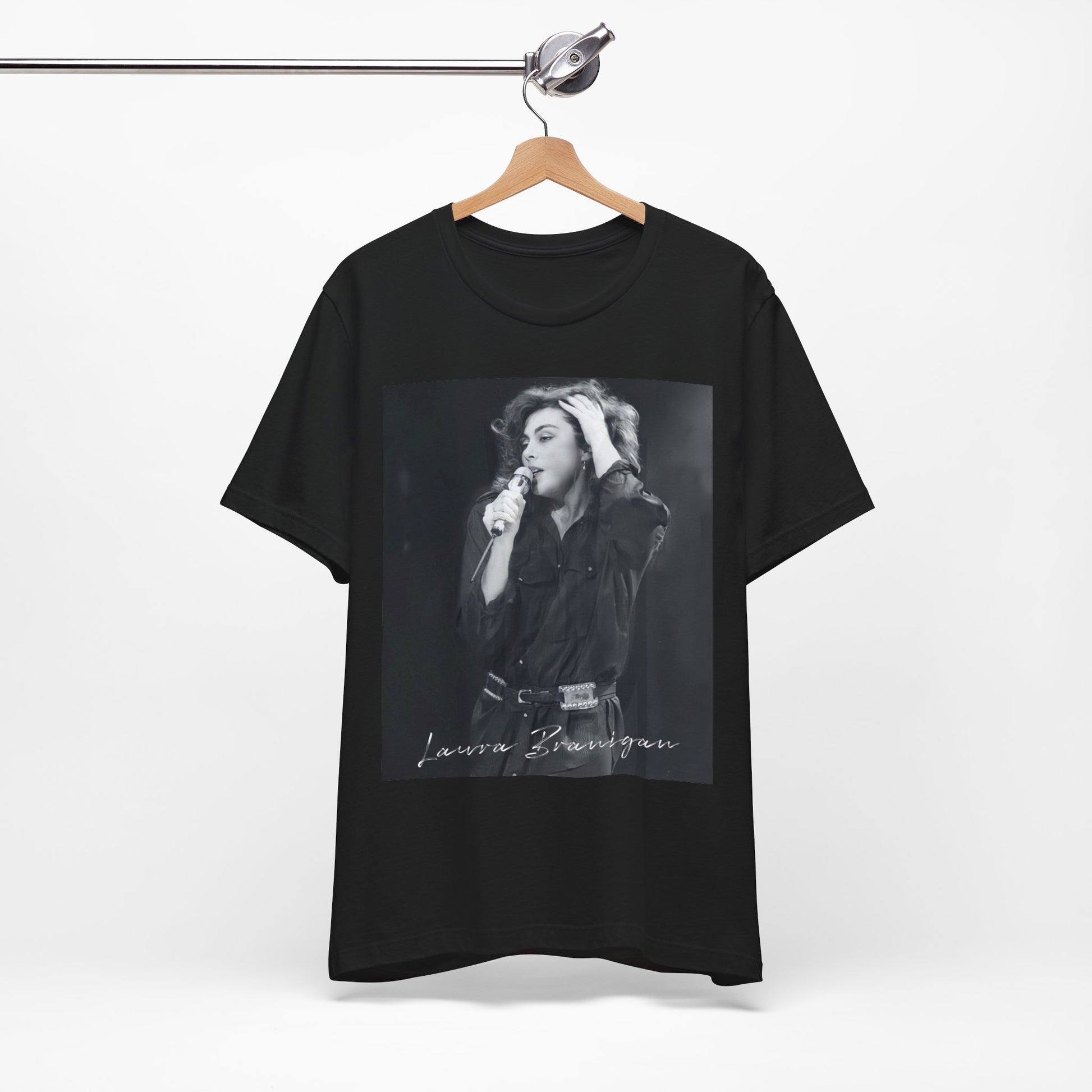 A black graphic t-shirt featuring an 80s live show graphic of Laura Branigan.