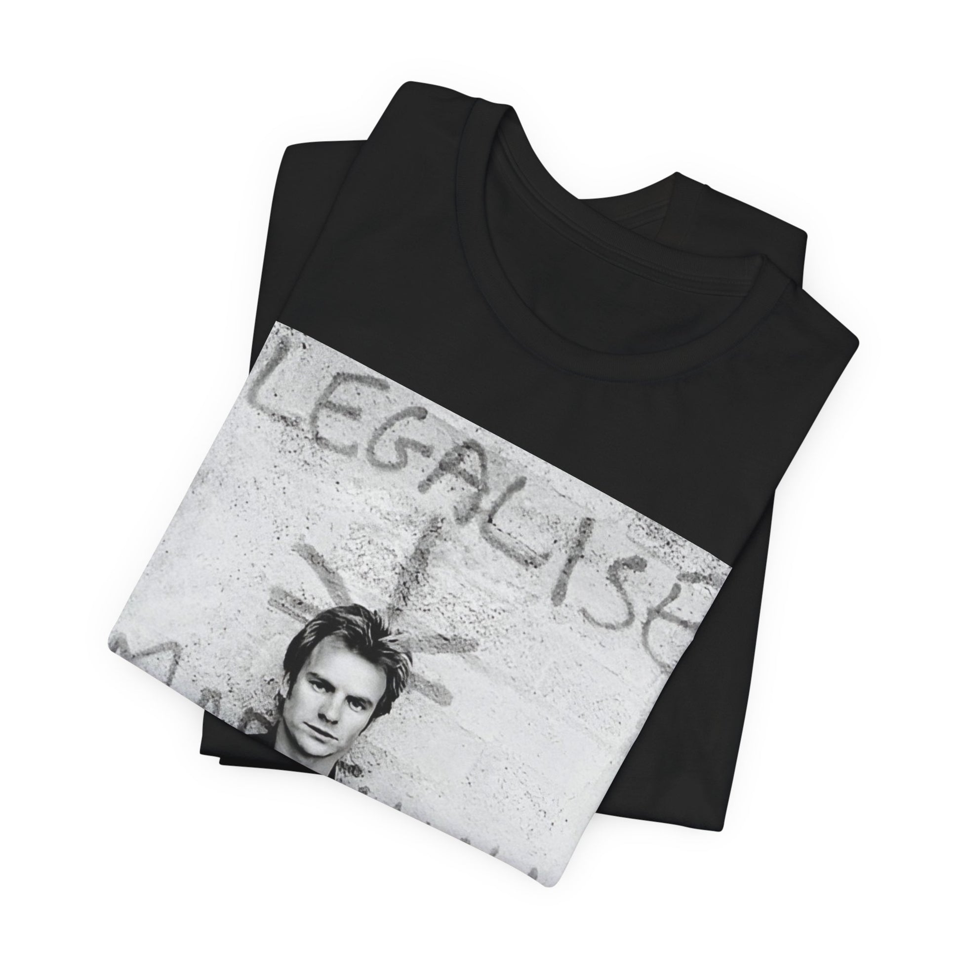 A black graphic t-shirt featuring a graphic of The Police with reggae-influenced pop elements.
