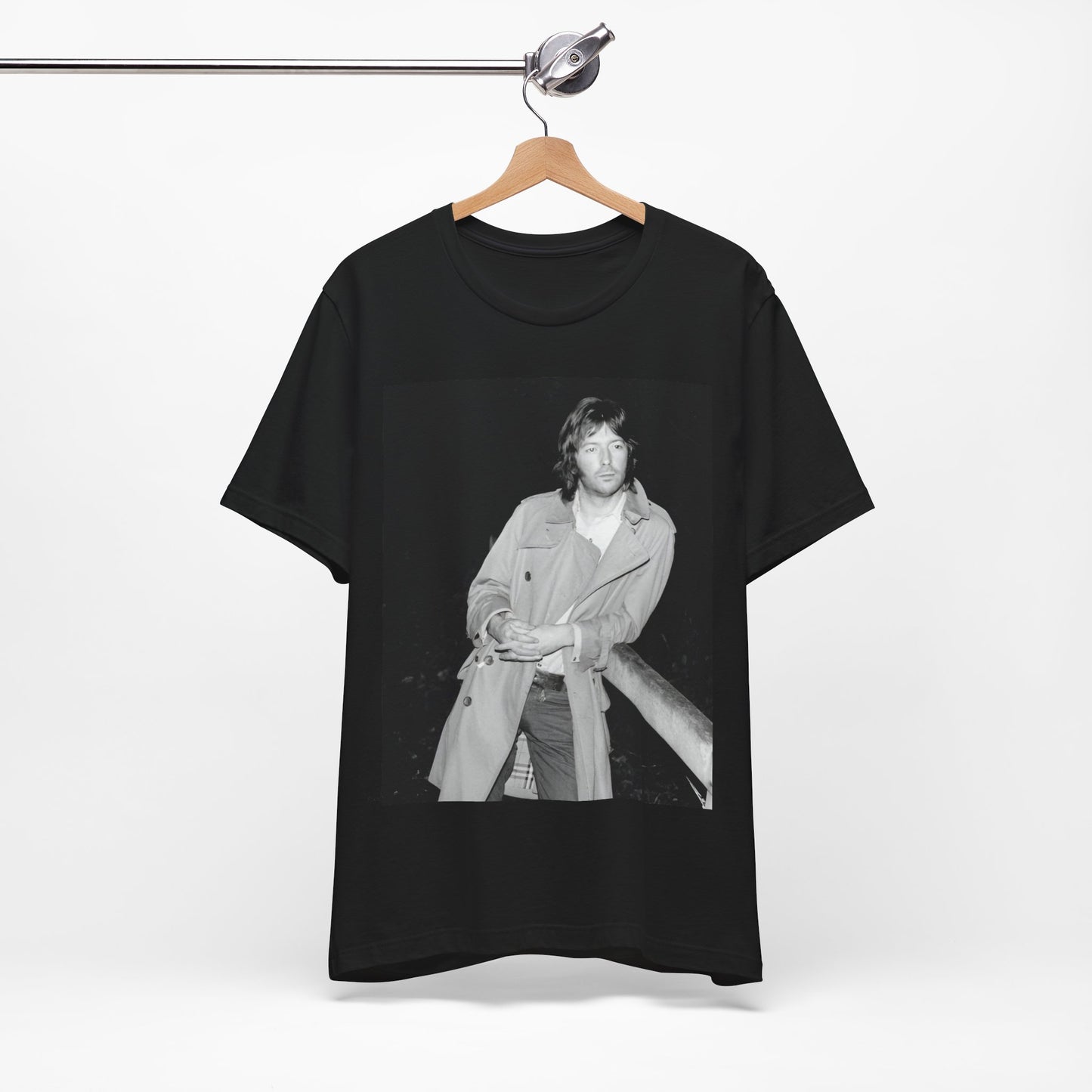 A black graphic t-shirt featuring a retro graphic of Eric Clapton as a blues master.