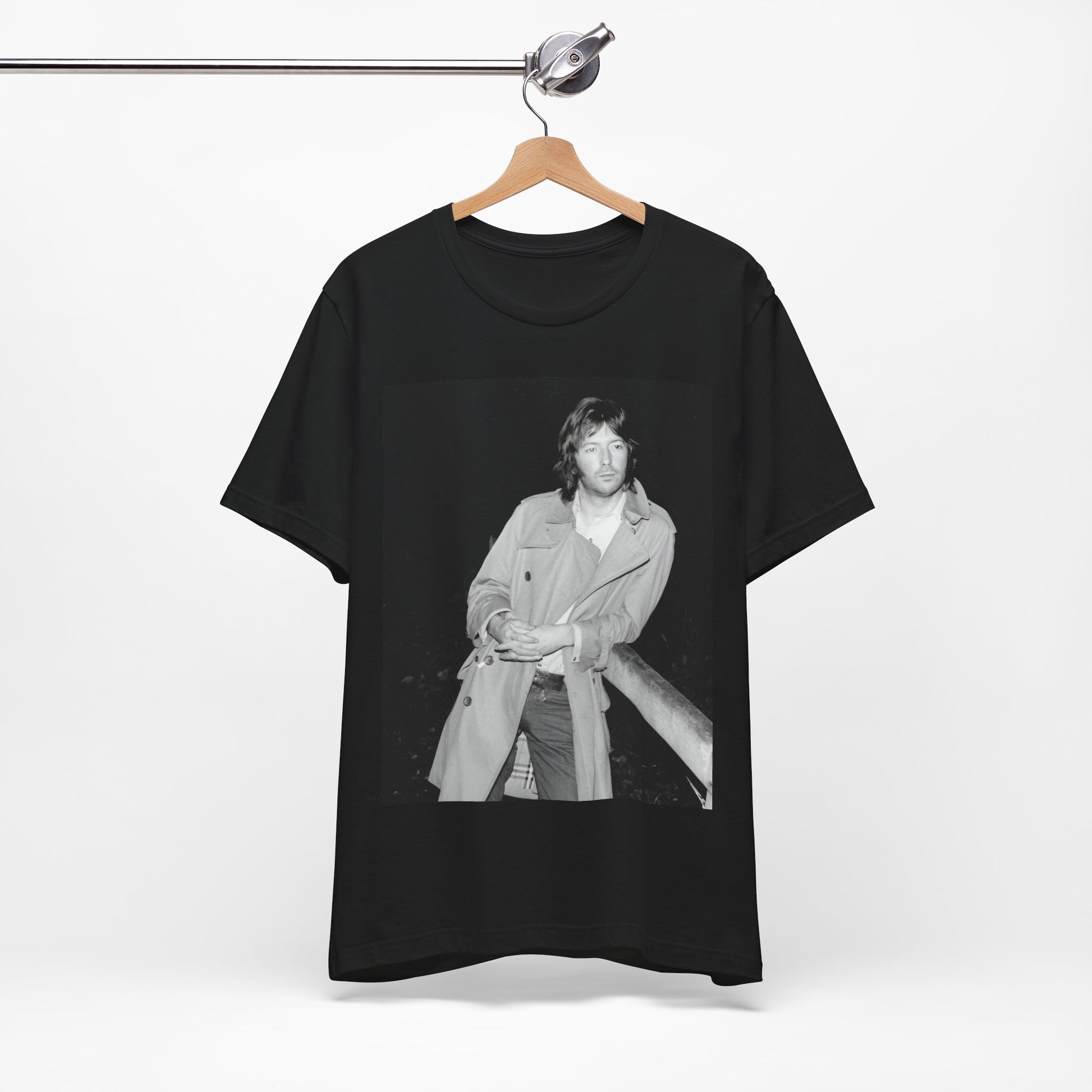 A black graphic t-shirt featuring a retro graphic of Eric Clapton as a blues master.