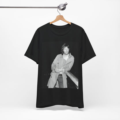 A black graphic t-shirt featuring a retro graphic of Eric Clapton as a blues master.