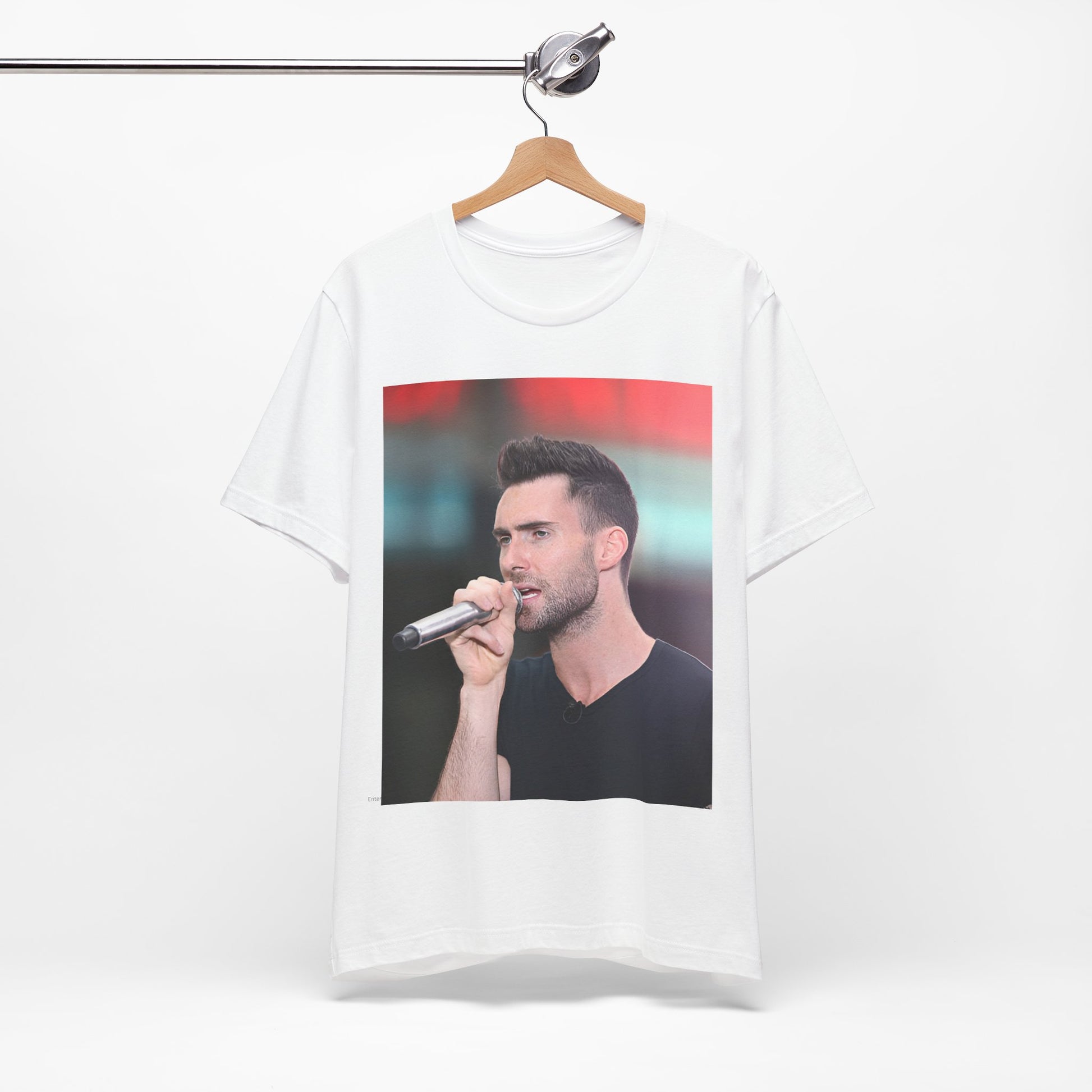 A stylized graphic inspired by the Maroon 5 song "Moves Like Jagger," with funky, retro design elements, on a t-shirt.