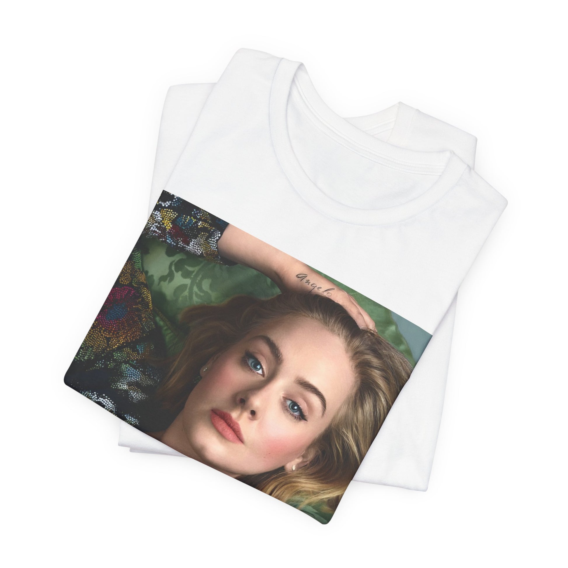 A black graphic t-shirt featuring a photo of Adele, possibly with floral elements or a floral background, showing a serene or contemplative expression.