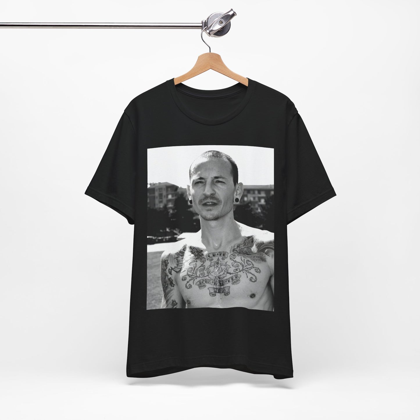 A black graphic t-shirt featuring a black and white graphic or photo portrait of Chester Bennington from Linkin Park.