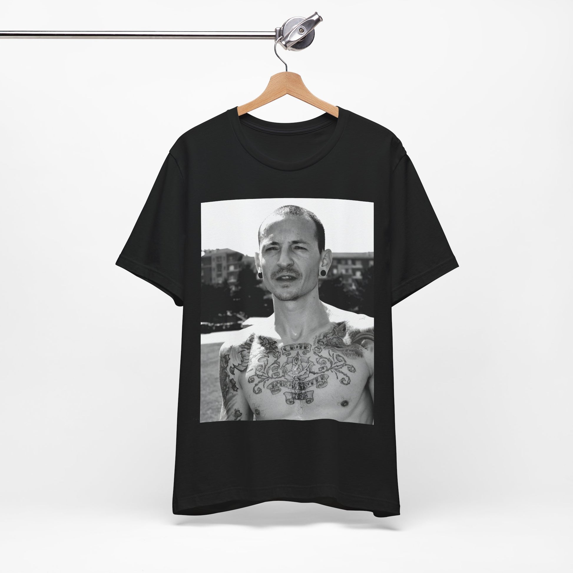 A black graphic t-shirt featuring a black and white graphic or photo portrait of Chester Bennington from Linkin Park.