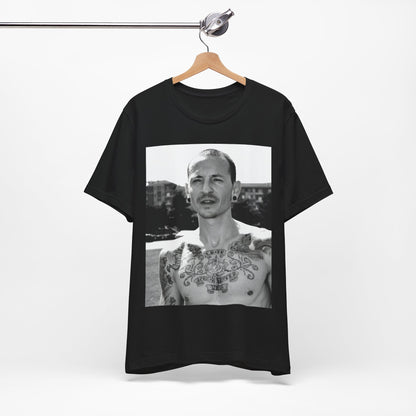 A black graphic t-shirt featuring a black and white graphic or photo portrait of Chester Bennington from Linkin Park.