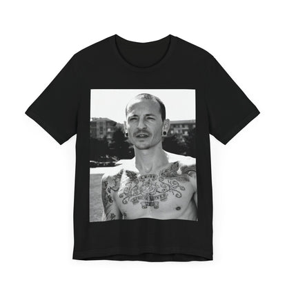 A black graphic t-shirt featuring a black and white graphic or photo portrait of Chester Bennington from Linkin Park.