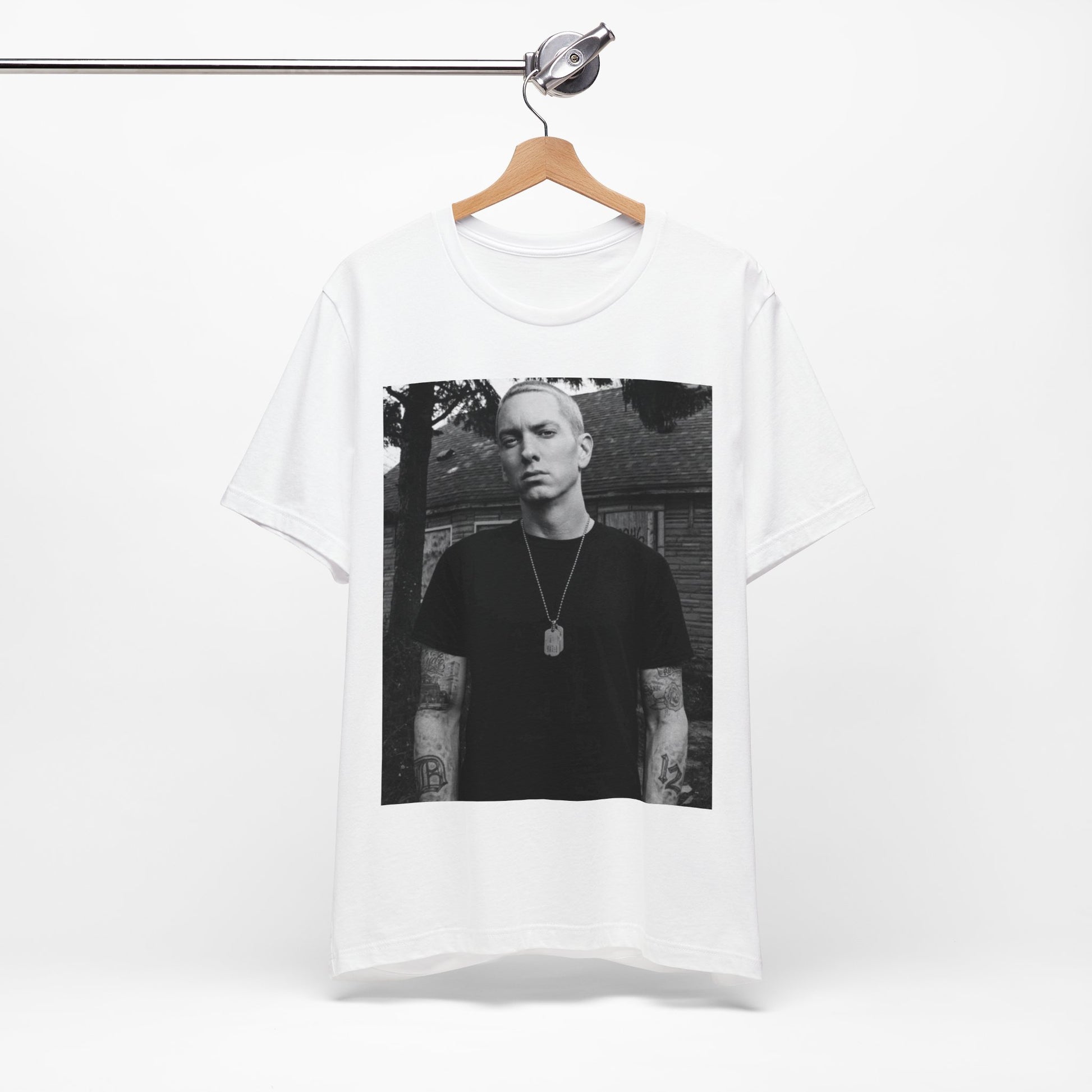 A black graphic t-shirt featuring a black and white graphic of Eminem as Slim Shady.