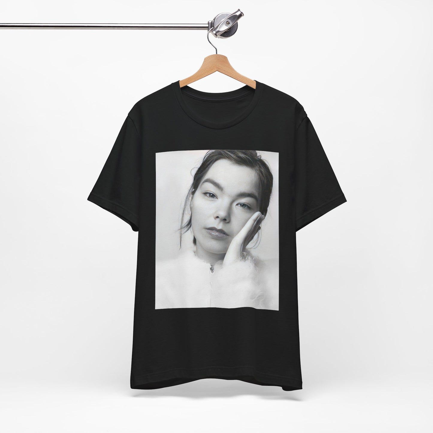 A black graphic t-shirt featuring a graphic related to Bjork's 'Post' album era, possibly with album art elements.