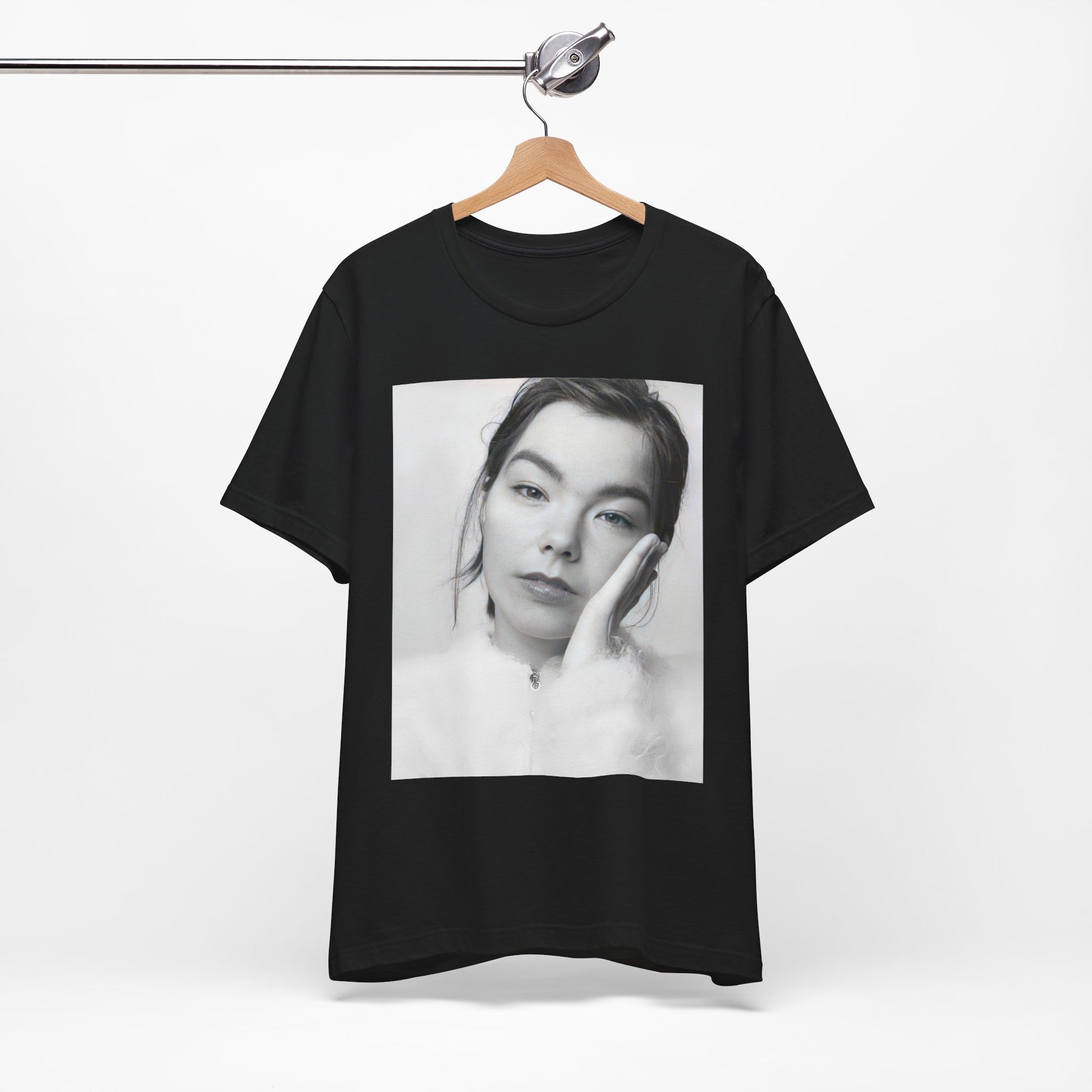 A black graphic t-shirt featuring a graphic related to Bjork's 'Post' album era, possibly with album art elements.