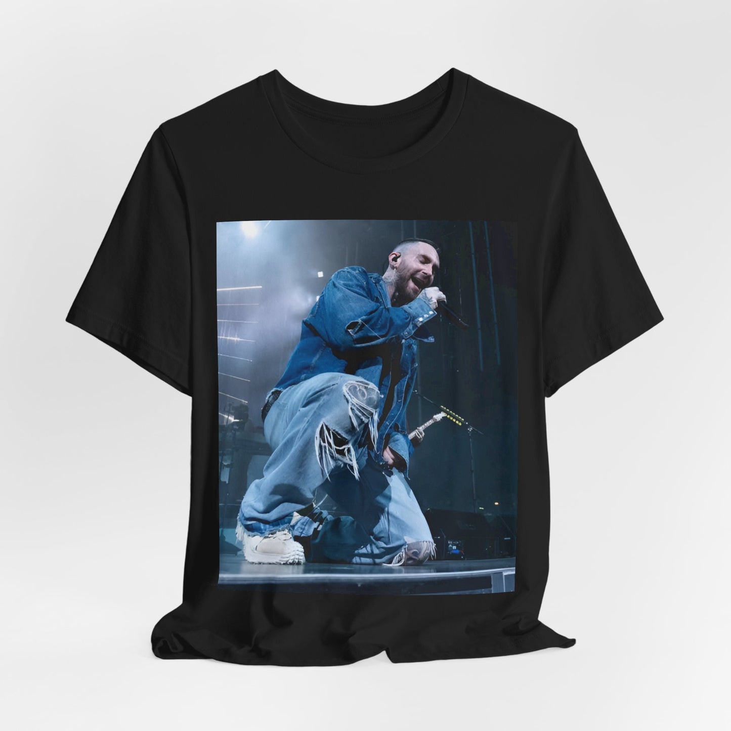 A modern, vibrant, and colorful group photo of the band Maroon 5, printed on a graphic t-shirt.
