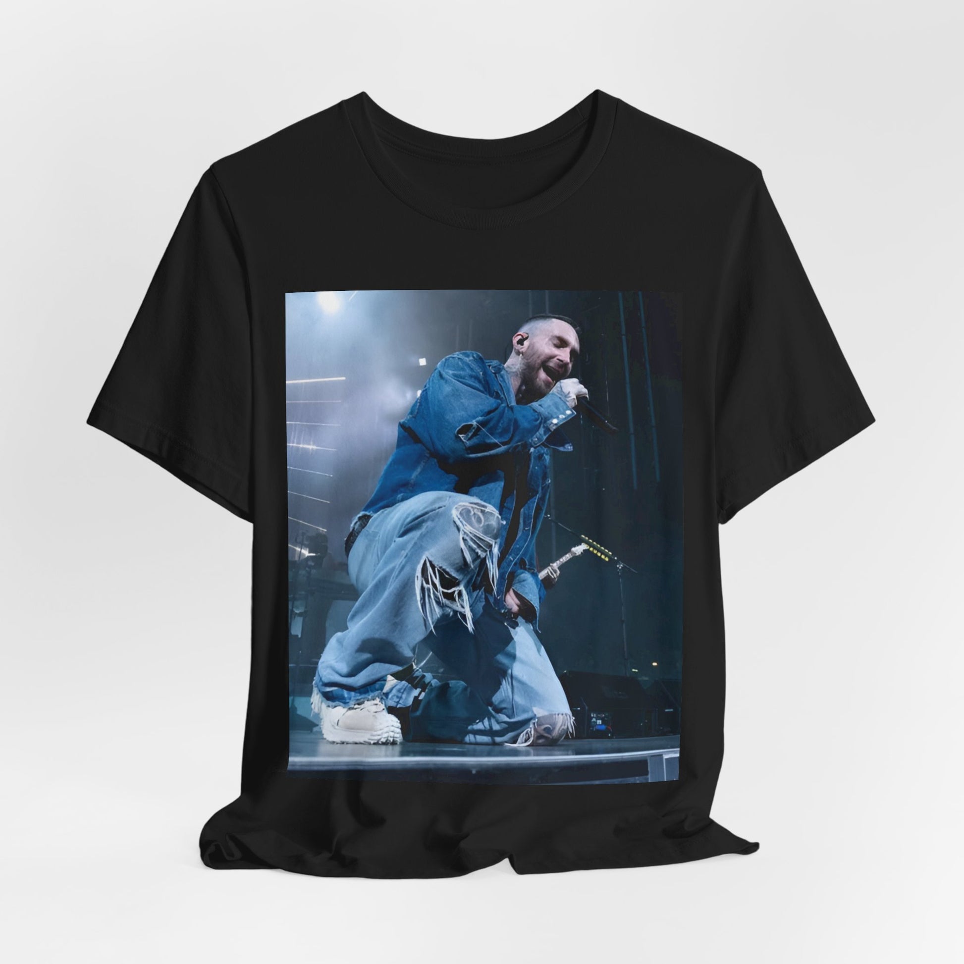 A modern, vibrant, and colorful group photo of the band Maroon 5, printed on a graphic t-shirt.