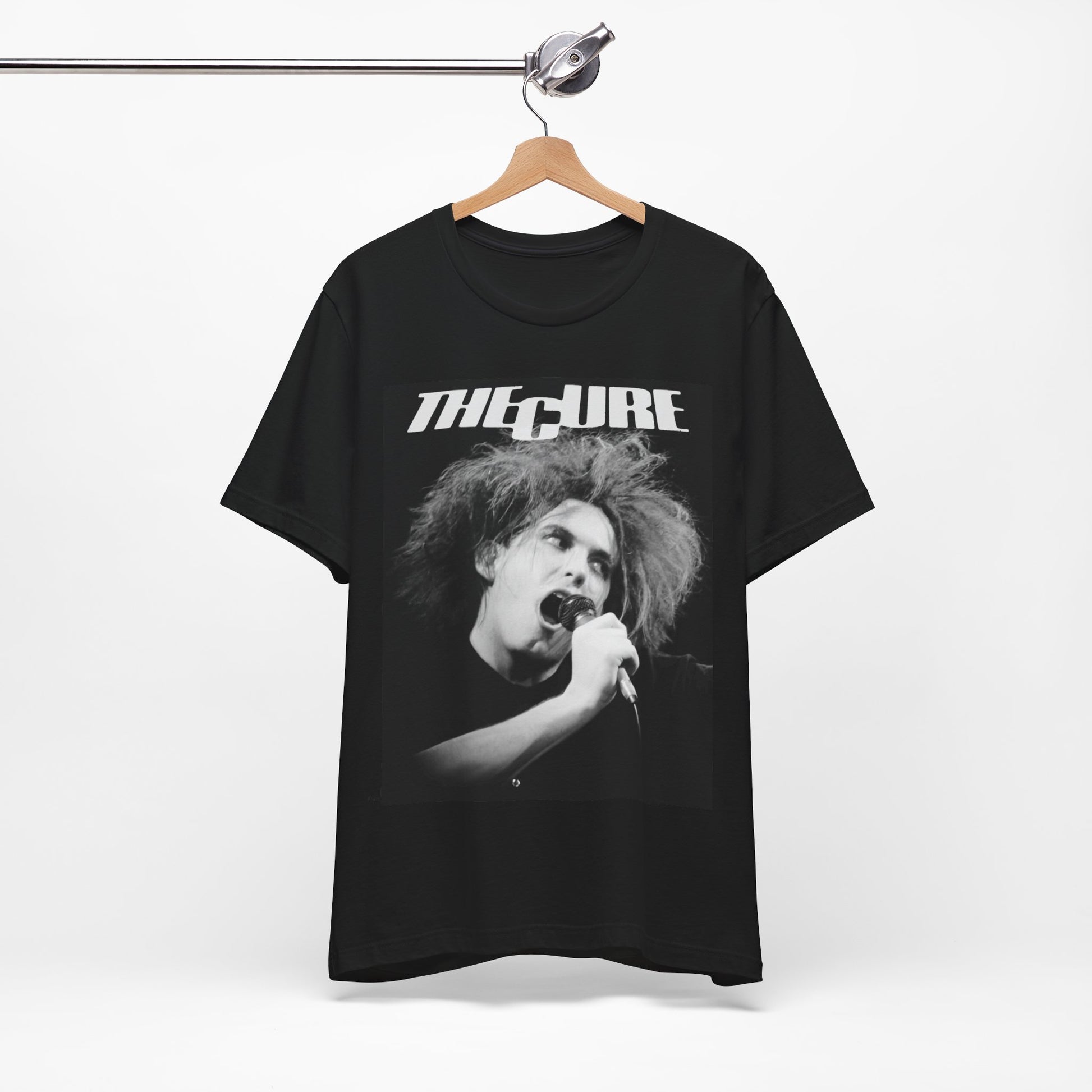 A black graphic t-shirt featuring a graphic of The Cure with a dark romanticism core aesthetic.