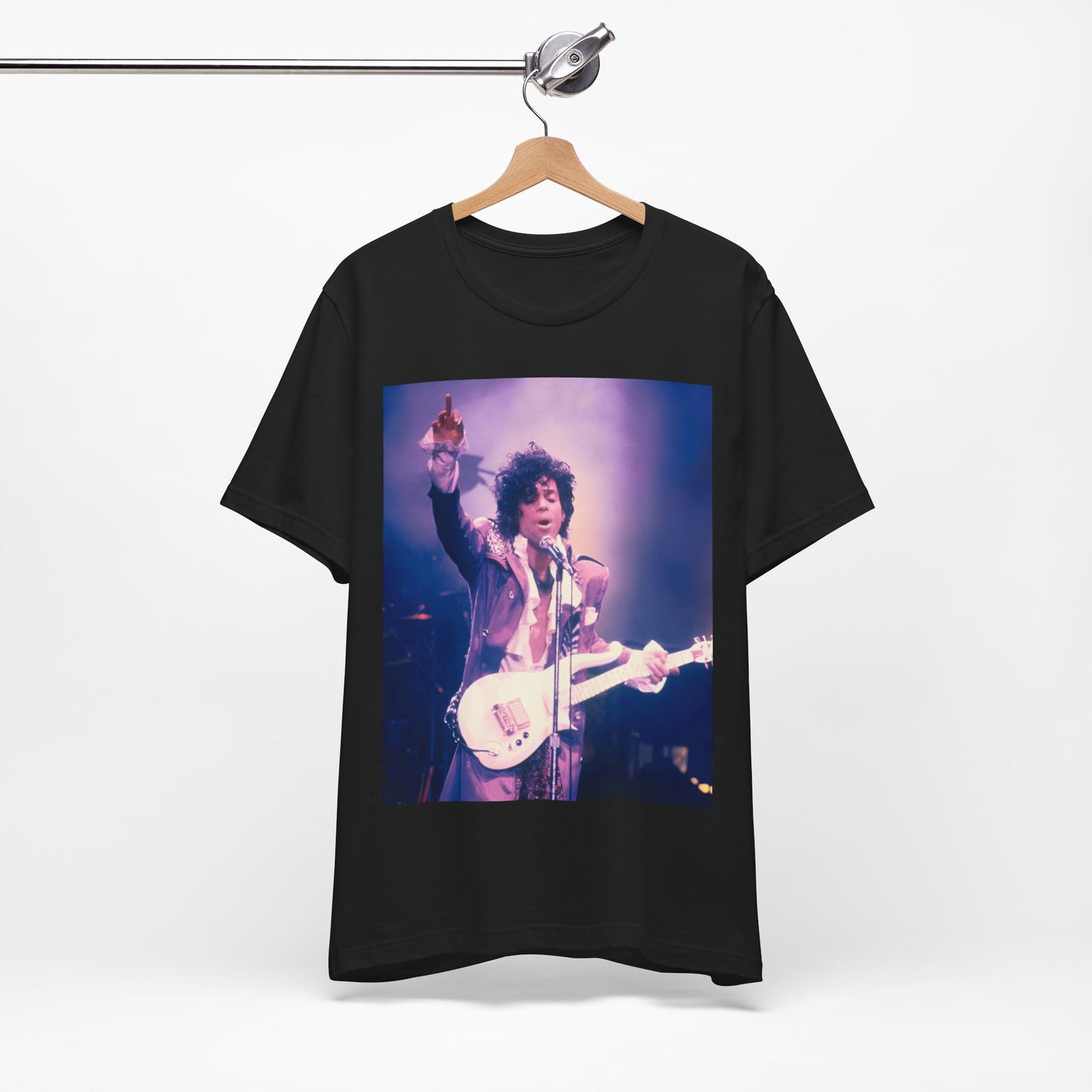 A black graphic t-shirt featuring a boxy graphic with a 'Purple Rain' vibe related to Prince.