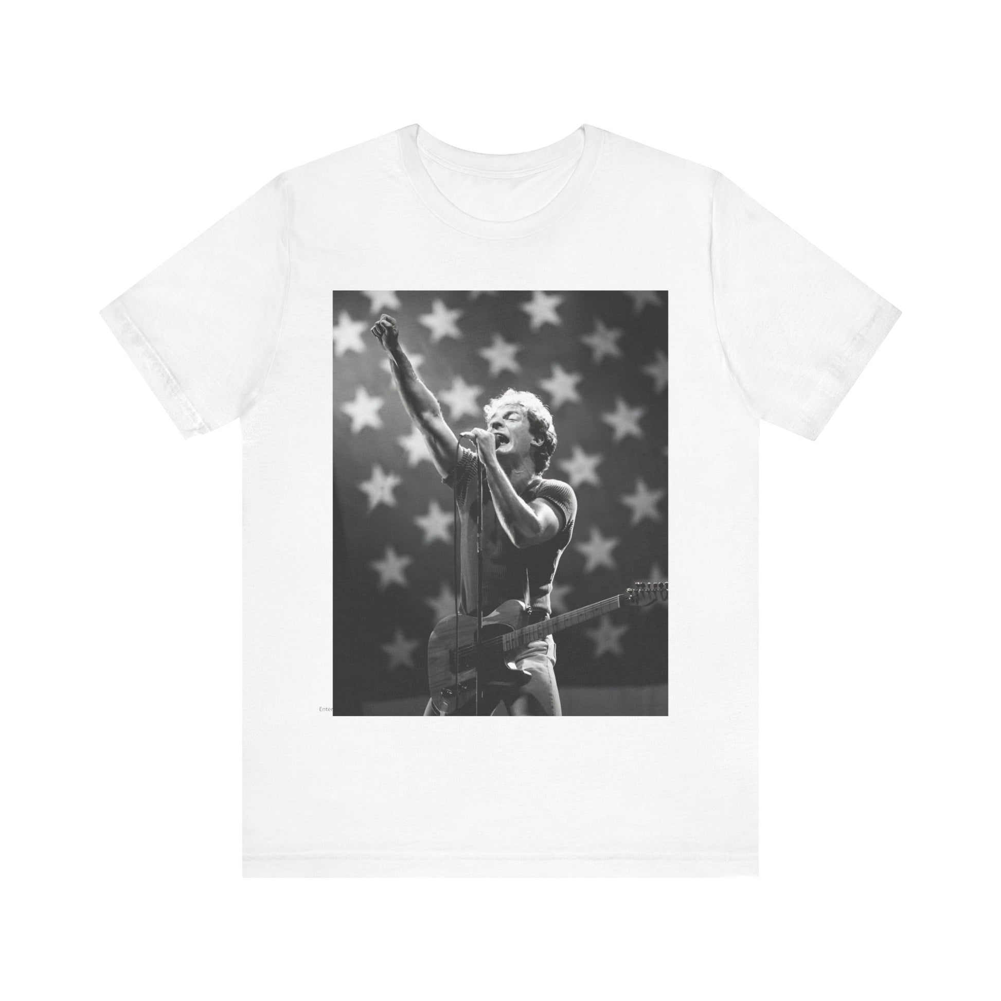 A black graphic t-shirt featuring a 70s era Americana-style graphic of Bruce Springsteen.